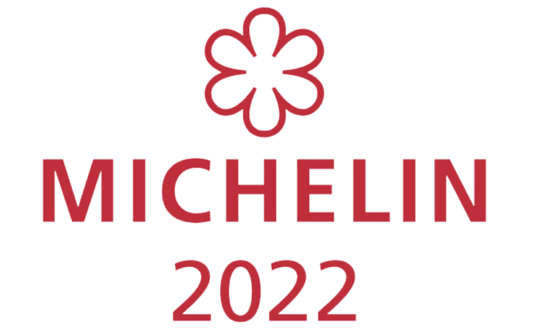 Logotipo oficial de la Guía Michelin destacando la Estrella Michelin del restaurante Peix & Brases, alta cocina en Dénia.
